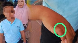 Korban AM dan ibu korban saat hendak melapor ke SPKT Polres Pohuwato atas dugaan Penganiayaan. Dok. Arsady