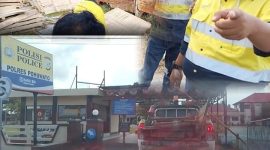 Pihak perusahaan saat menurunkan talang-talang milik warga di Mapolres Pohuwato